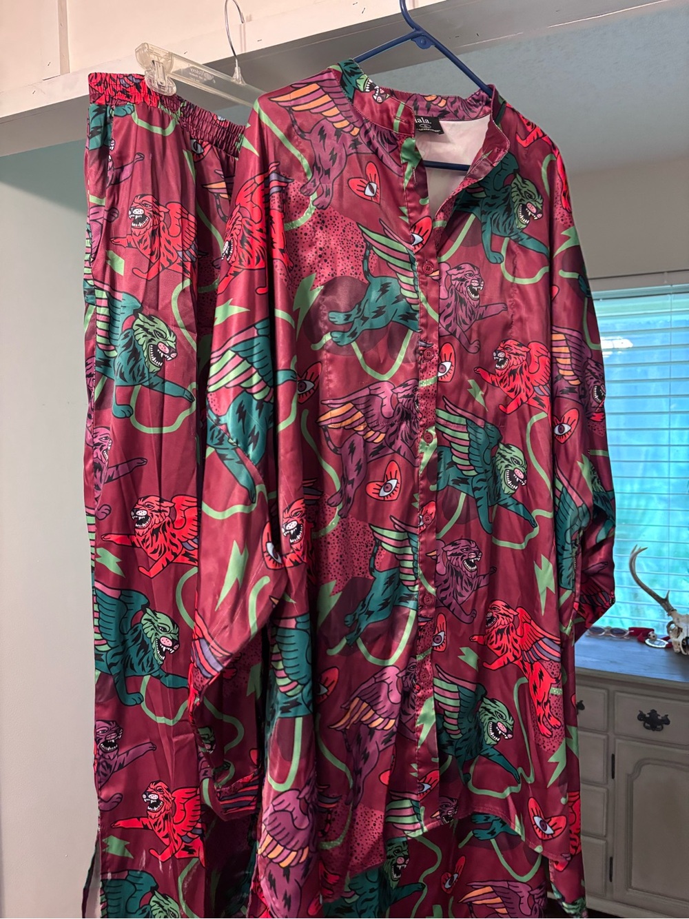 Dressed In lala satin playsuit, Winged Tiger and heart eyes Print Size XL.